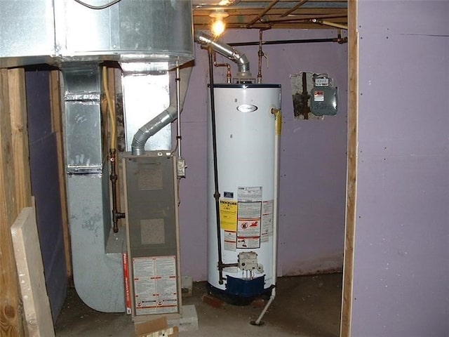 utility room with gas water heater