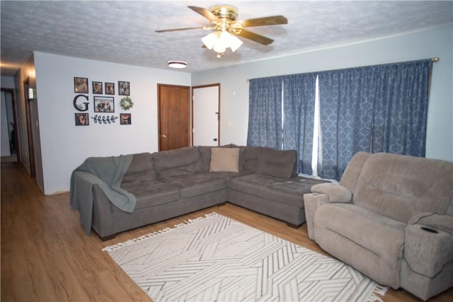 983 Vernon Rd, West Salem Twp, PA 16125 - living area featuring ceiling fan, a textured ceiling, and wood finished floors