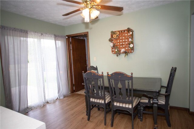 983 Vernon Rd, West Salem Twp, PA 16125 - dining space featuring ceiling fan, a textured ceiling, and wood finished floors