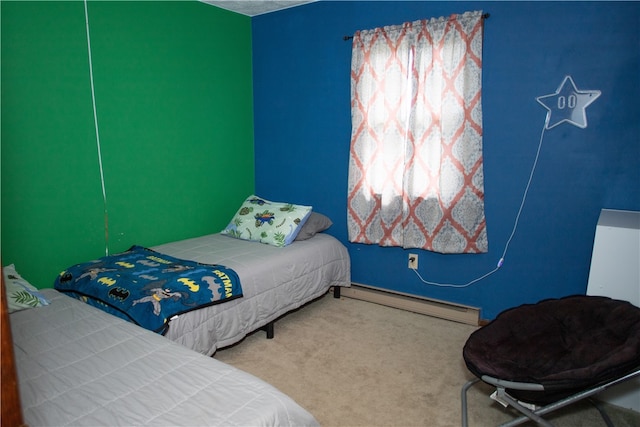 bedroom featuring a baseboard radiator and carpet