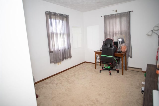 983 Vernon Rd, West Salem Twp, PA 16125 - office space featuring a textured ceiling, carpet, baseboards, and a baseboard heating unit