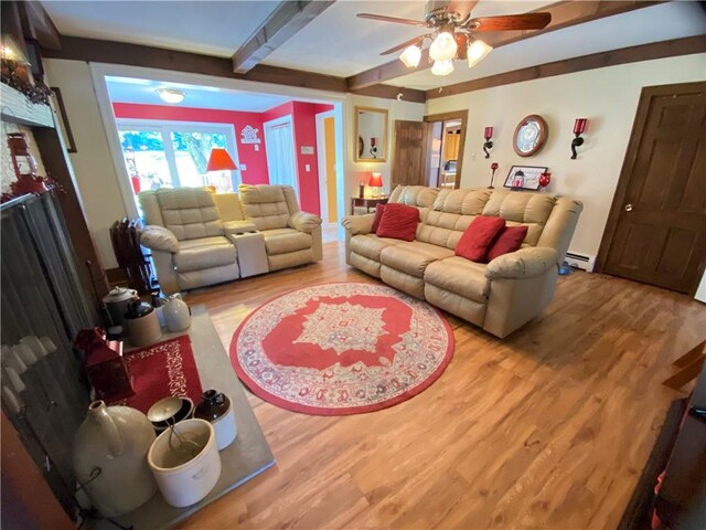 living room with beam ceiling, hardwood / wood-style flooring, ceiling fan, and a baseboard heating unit