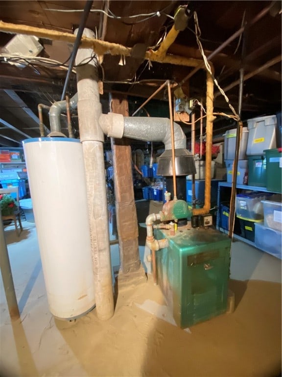 utility room featuring gas water heater