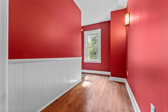 corridor featuring hardwood / wood-style flooring