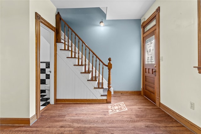 entrance foyer featuring wood-type flooring