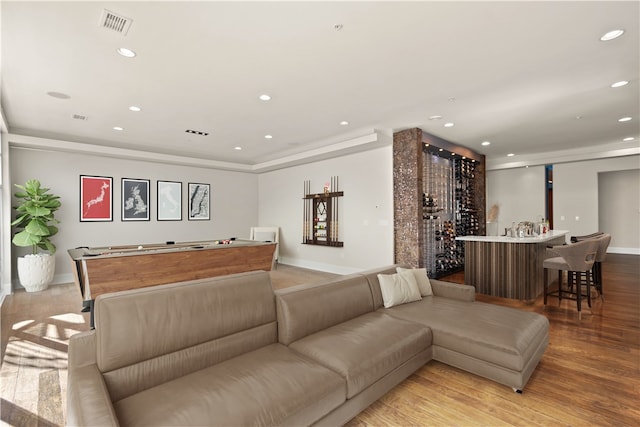 living room with light hardwood / wood-style flooring