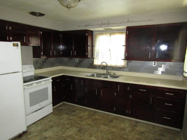 kitchen with sink, white appliances, and tasteful backsplash