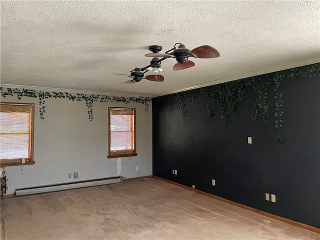 carpeted spare room featuring ceiling fan, a textured ceiling, a baseboard radiator, and crown molding