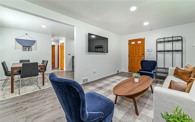 living room featuring light wood-type flooring