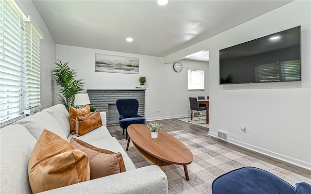 living room with light hardwood / wood-style floors