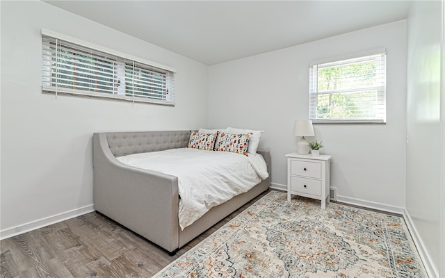 bedroom featuring hardwood / wood-style floors