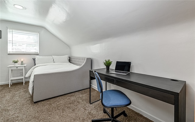 carpeted bedroom featuring vaulted ceiling