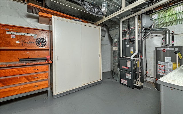 utility room with water heater and heating unit