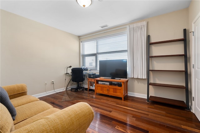 living room featuring dark hardwood / wood-style flooring