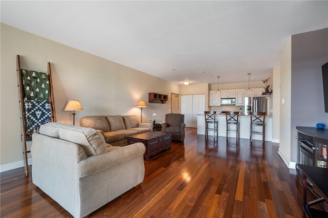 living room with dark wood-type flooring