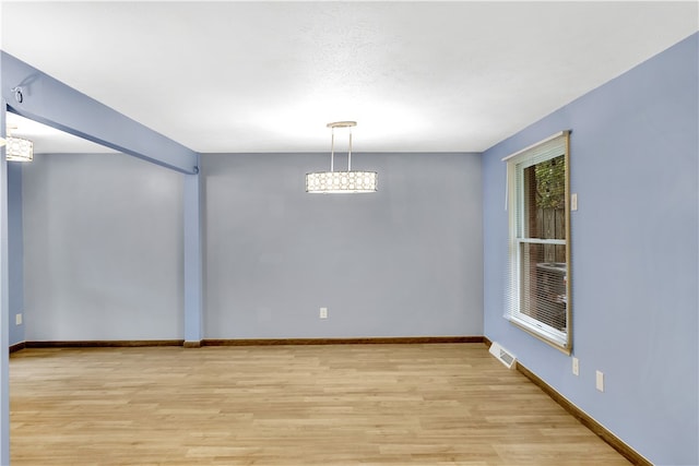 empty room featuring light hardwood / wood-style floors