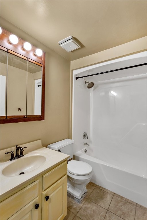 full bathroom with tub / shower combination, vanity, toilet, and tile patterned floors