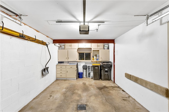 garage featuring a garage door opener