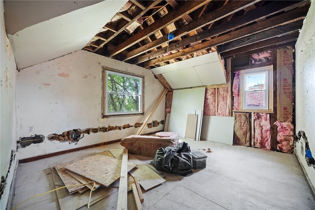 misc room with lofted ceiling