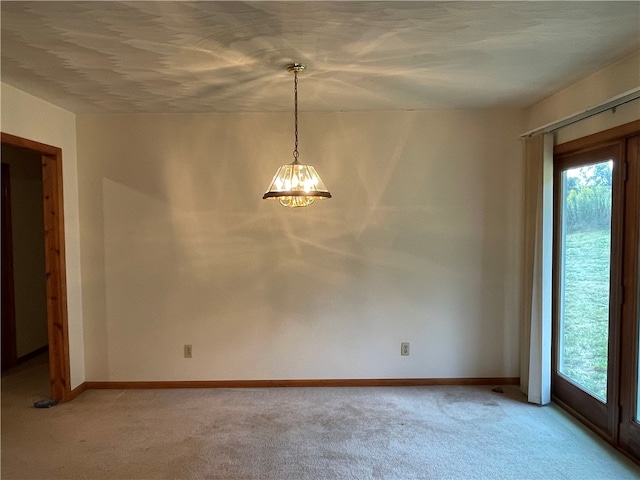 unfurnished room featuring carpet floors