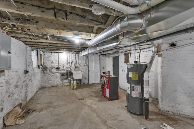 basement with electric water heater and electric panel