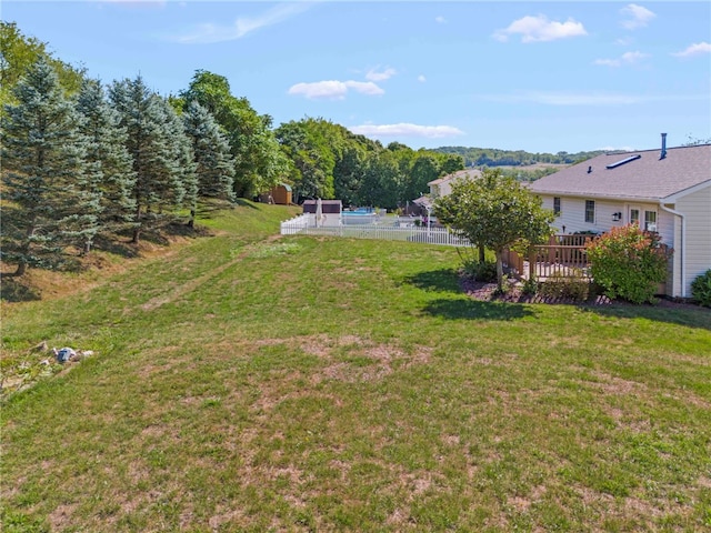 view of yard featuring a deck