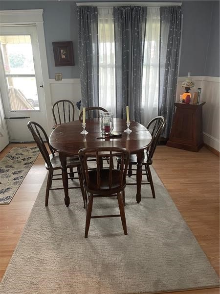 dining room with wood-type flooring