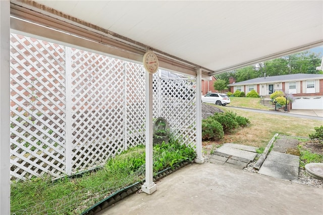 view of patio / terrace with a garage