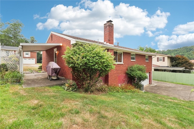 exterior space featuring a carport