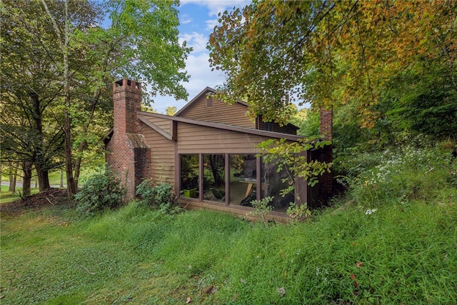 exterior space with a lawn