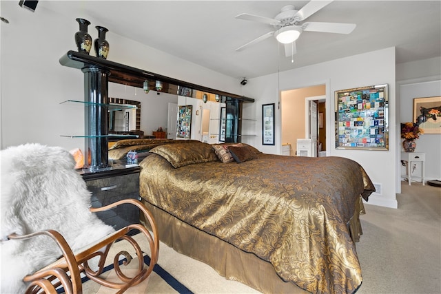 bedroom featuring light carpet and ceiling fan