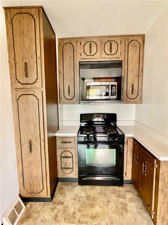 kitchen with black range with gas stovetop