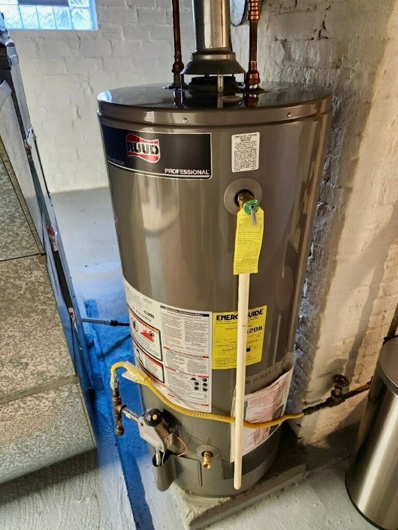 utility room with water heater