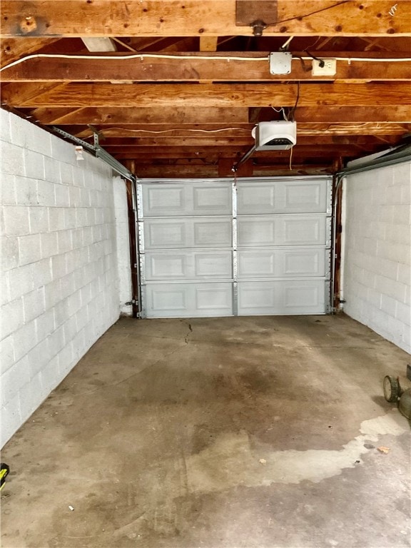 garage featuring a garage door opener