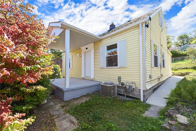 exterior space with a patio and central AC unit