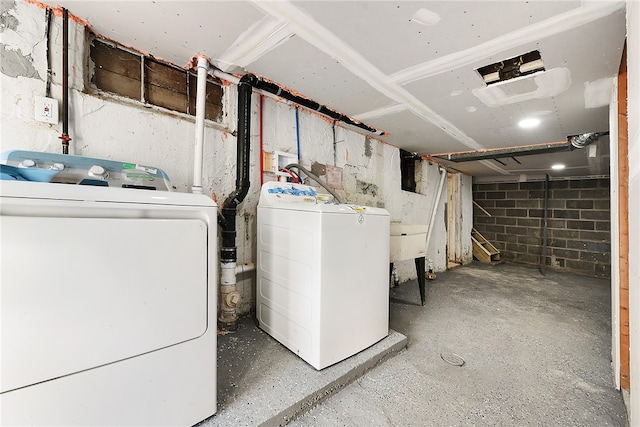 laundry room featuring washing machine and dryer