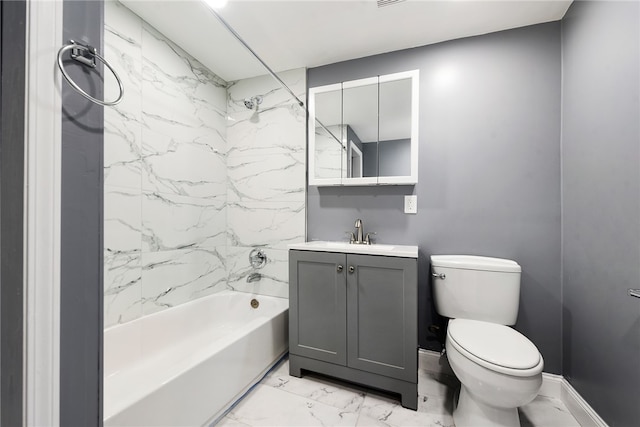 full bathroom featuring vanity, toilet, and tiled shower / bath