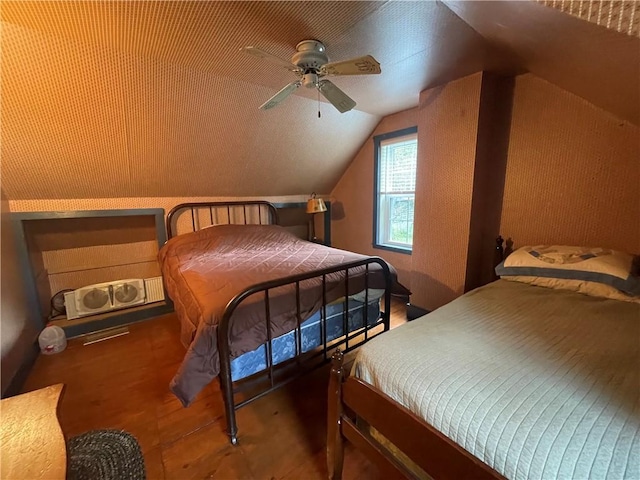 bedroom with ceiling fan and lofted ceiling