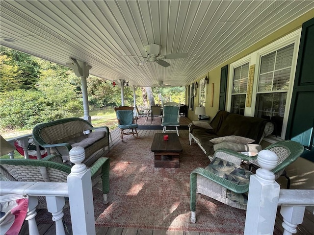 view of patio featuring an outdoor hangout area and ceiling fan