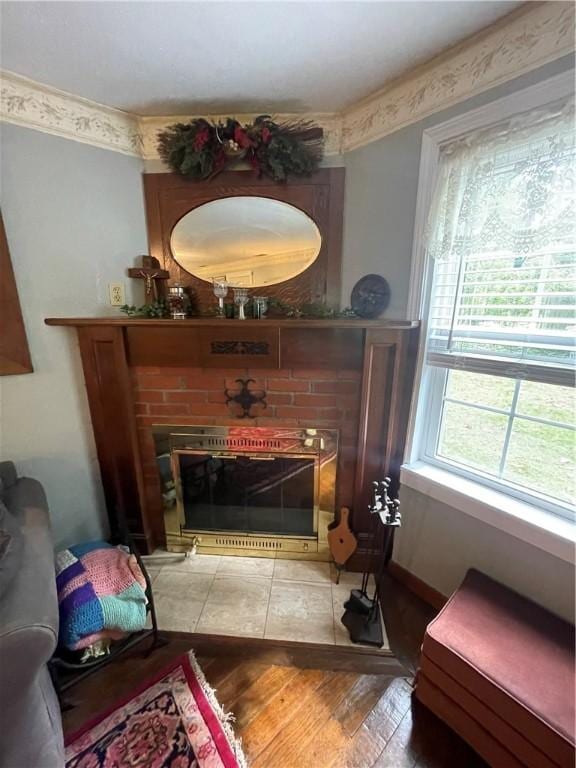 interior space with a fireplace and hardwood / wood-style floors