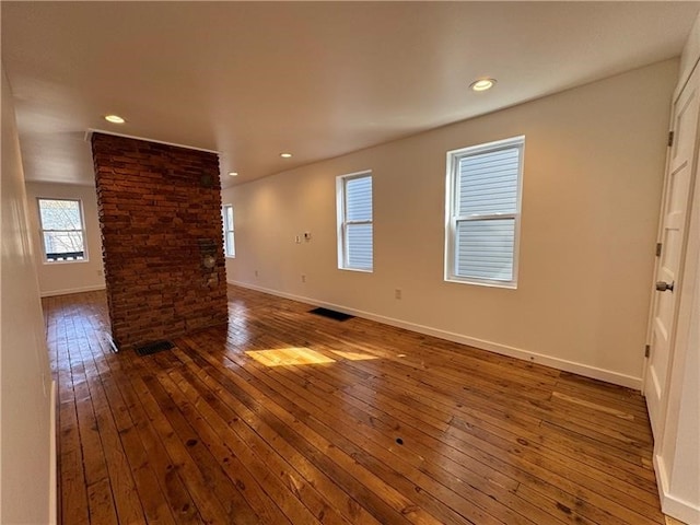 empty room featuring dark wood-type flooring