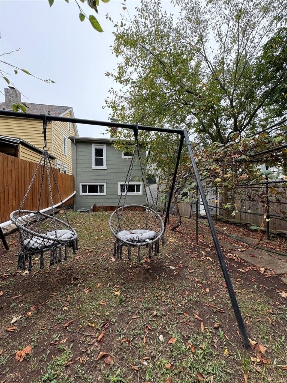 view of yard with a fire pit