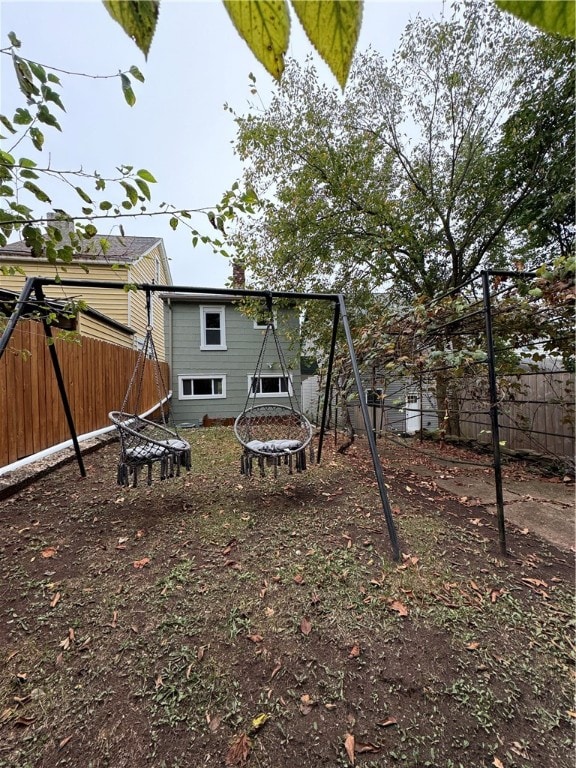 view of yard with a fire pit