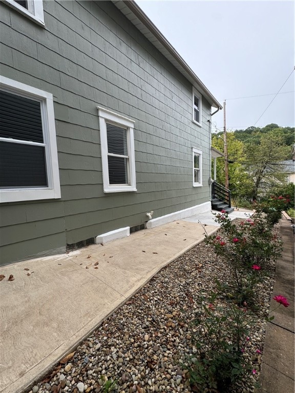 view of property exterior featuring a patio