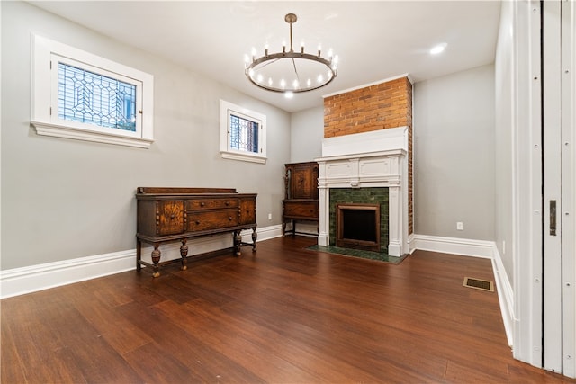 interior space with an inviting chandelier and dark wood-type flooring