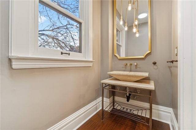 bathroom with wood-type flooring and vanity