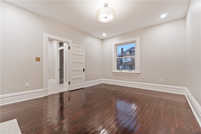 empty room featuring hardwood / wood-style floors