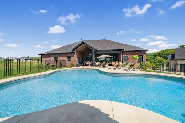 view of pool featuring a patio