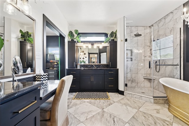 bathroom with independent shower and bath and vanity