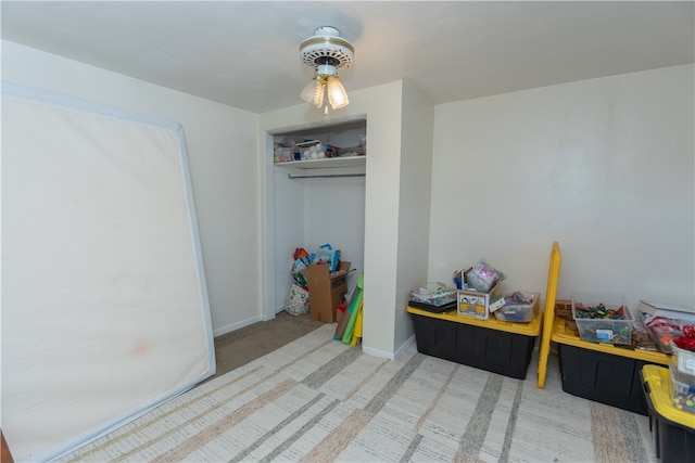 bedroom featuring light colored carpet